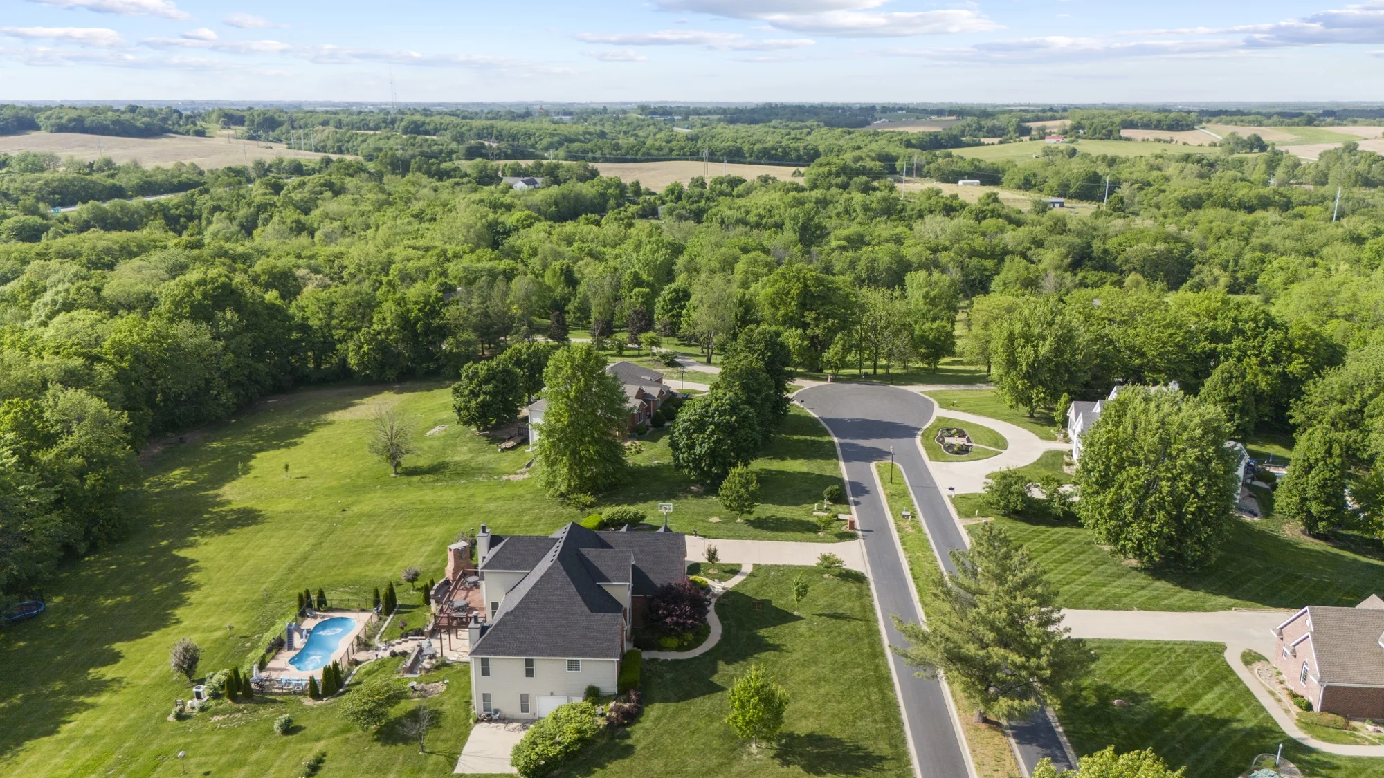 Neighborhood and surrounding countryside photographed from the air in Saint Joseph.